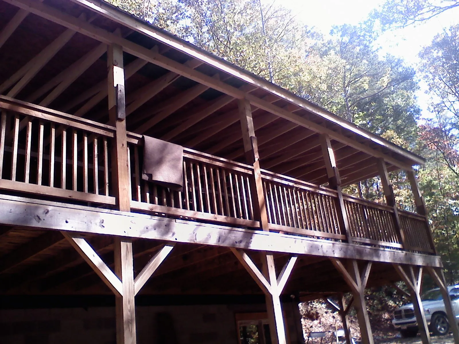 Timber framing under a new elevated porch and deck — Roof Leak Repair in North Webster by Roofing Brothers